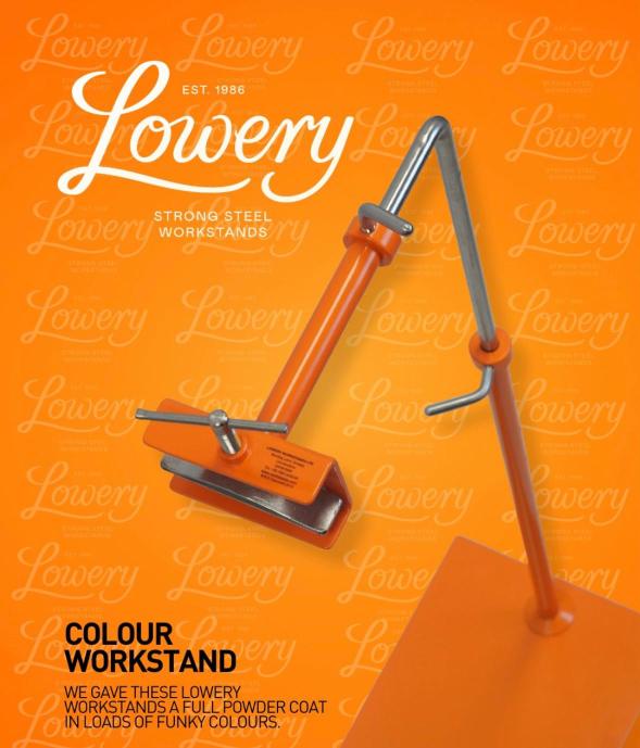 An orange steel workstand is displayed against a matching orange background with repeating "Lowery" logos and product details.